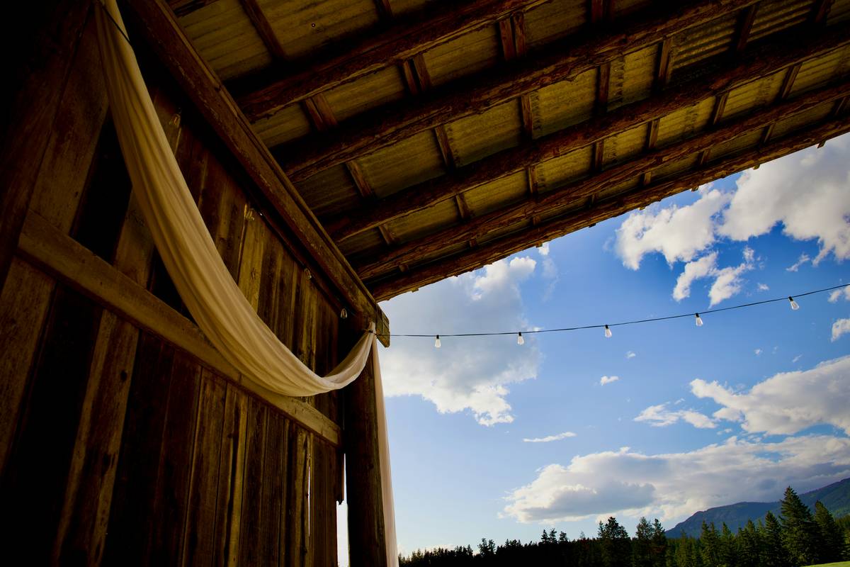custom made outdoor curtains installed on a covered patio with proper height and width coverage