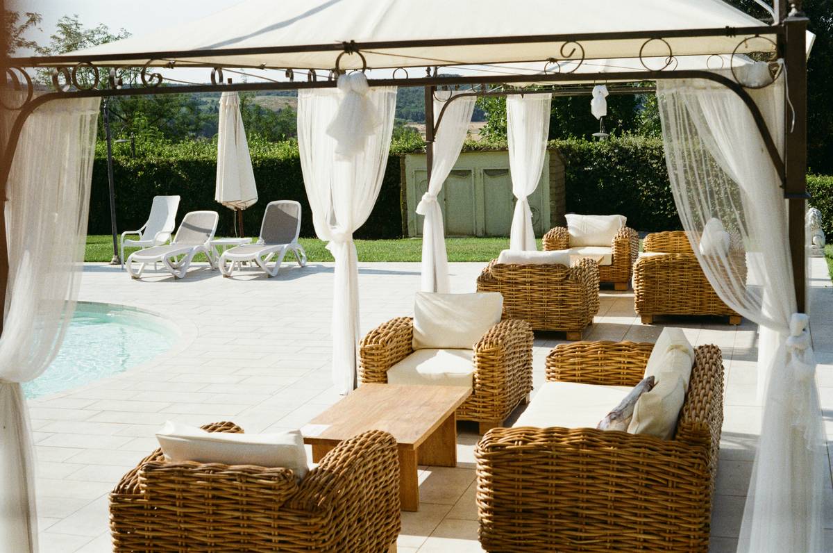 outdoor curtains for patio on a covered deck with stainless steel grommets and rust-proof rod